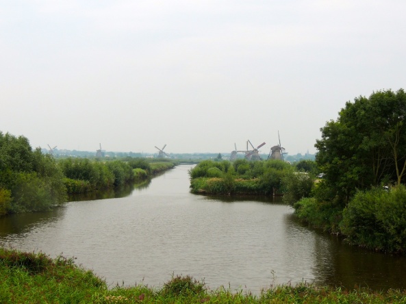 Windmills on the shoreline of Kinderdijk, Holland.